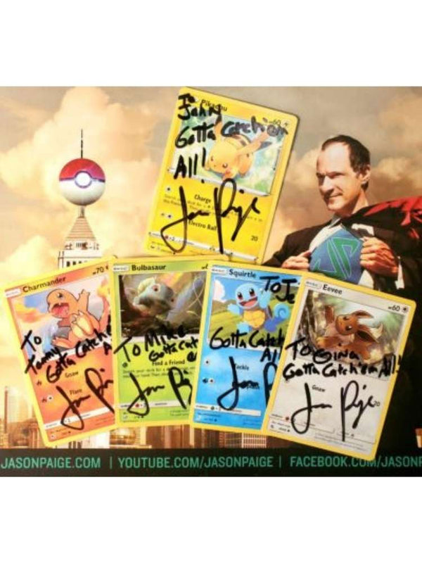Collection of trading cards with autographs against a backdrop featuring a Poké Ball and a JP in a superhero costume.